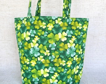 shamrock gift bag with green clover design, cotton fabric tote with handles, eco-friendly, gift wrapping, 7" tall x 9" wide