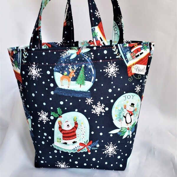 fabric cotton gift bag with winter snow globes, medium size tote with handles, festive holiday wrapping for adults and children