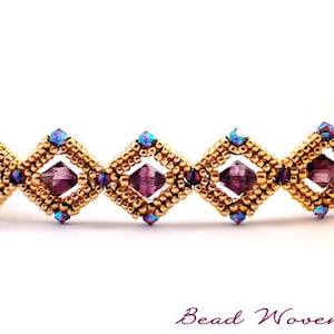 May include: A beaded bracelet featuring a repeating pattern of gold-colored square frames, each containing a purple crystal. Small blue crystals accent the corners. The bracelet is on a white background. The text "Bead Woven Dreams" is at the bottom.