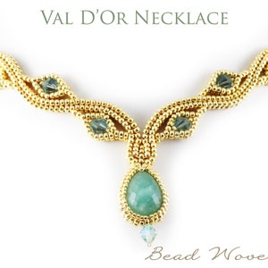 May include: A gold necklace with a green gemstone pendant. The necklace is made of small gold beads and features a woven design. The text "Val D'or Necklace" is displayed above the necklace and "Bead Woven Dreams" is displayed below the necklace.