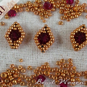 May include: Close-up of four beaded jewelry pieces with a red crystal center. The pieces are surrounded by gold beads and are on a white fabric background. The text "Bead Woven Dreams" is visible at the bottom of the image.
