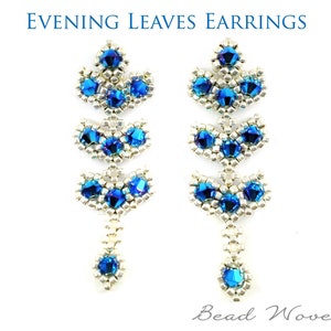 May include: A pair of silver earrings with blue crystal beads in a leaf design. The earrings are called "Evening Leaves Earrings" and are made by "Bead Woven Dreams".