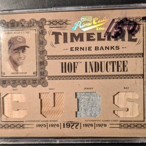 Ernie Banks Timeline Jersey Bat Card Authentic Game Used Relics Limited to /25 Chicago Cubs Nice Grade carta da baseball super originale