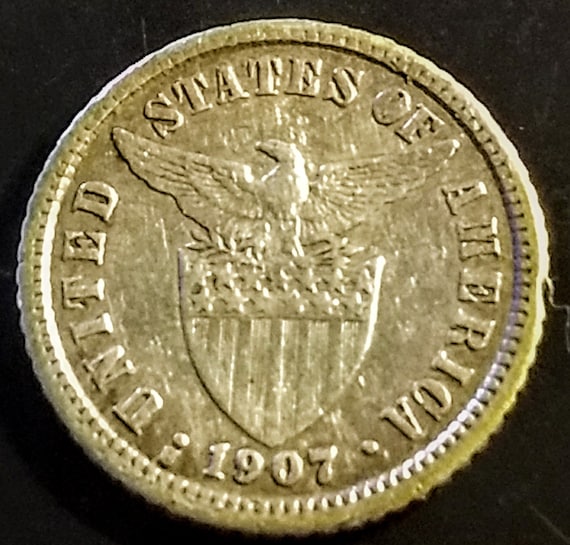 A 1907 Silver Solid Grade Filipinas Ten Centavos Philipines Coin