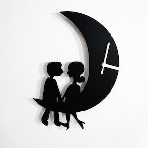 Couple Sitting on the Moon - Wall Clock