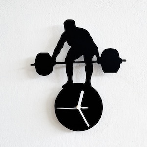 Silueta de levantador de pesas Mr Universe - Reloj de pared