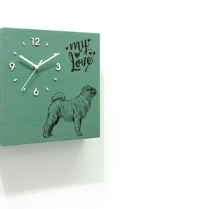 May include: A square clock with a green face, white hands and black numbers. The clock face features a black and white illustration of a Shar-Pei dog and the text "my love" with a heart symbol.
