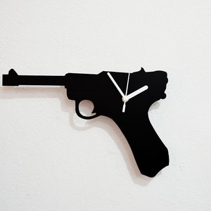 Silueta de arma de pistola de mano - Reloj de pared