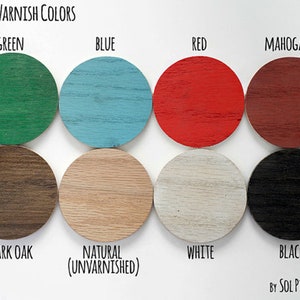 May include: Wood varnish color samples in green, blue, red, mahogany, dark oak, natural (unvarnished), white, and black.