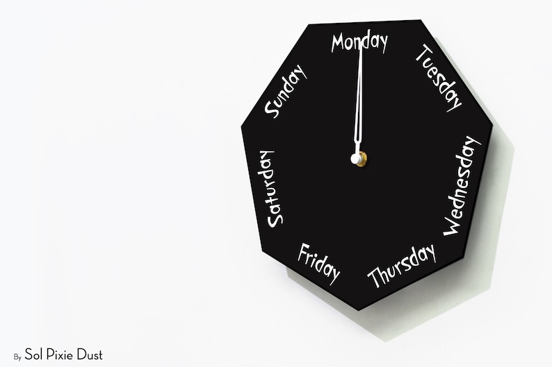 DayClocks - Heptagon Black Wall Clock - Day of The Week Clock - DayClocks - Heptagon Black Wall Clock - Day of The Week Clock -