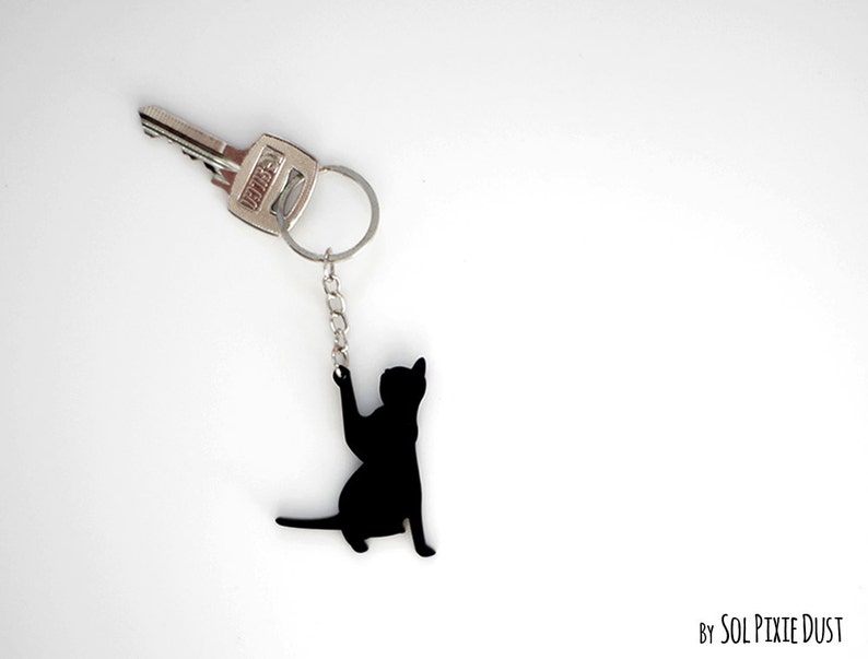 Keychain Silhouette Cat playng