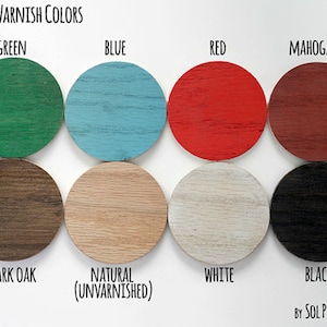 May include: Wood varnish color samples in green, blue, red, mahogany, dark oak, natural (unvarnished), white, and black.