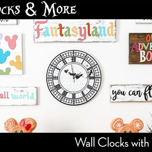 May include: A white wall with various wall decor, including a clock with black Roman numerals, a sign that says "Fantasyland", and a sign that says "Our Adventure Book". The wall decor is themed around Disney.