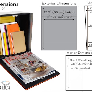 May include: A silver mailbox with a black flap and orange trim. The mailbox is open and has a magazine inside. The mailbox has exterior dimensions of 13.7 inches high by 11 inches wide and interior dimensions of 11.4 inches high by 9.8 inches wide.