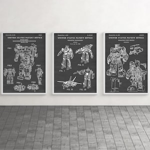 May include: Three black and white patent drawings of Transformers toys. The first drawing shows a robot in both robot and vehicle mode. The second drawing shows a robot in both robot and jet mode. The third drawing shows a robot in both robot and truck mode.