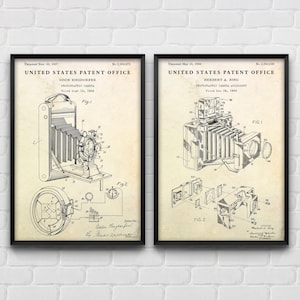 May include: Two vintage patent drawings for photographic equipment. The first patent is for a photographic camera, dated November 20, 1937, and the second patent is for a photographic camera accessory, dated May 31, 1966.