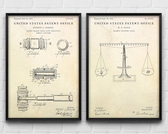 May include: Two framed vintage patent prints. One shows a detailed diagram of a hollow-headed gavel with telescopic handle sections. The other depicts a balance weighing scale. Both prints are in black and white.