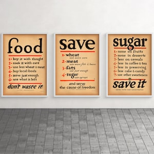 May include: Three vintage World War II era posters with a beige background and red and black text. The posters encourage people to save food, wheat, meat, fats, sugar, and to serve the cause of freedom. The posters also encourage people to save sugar by using less in fruits, desserts, cereals, coffee and tea, preserving, cake and candy, and other sweeteners.