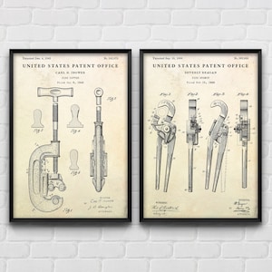 May include: Two framed vintage patent prints of pipe tools. The left print features a pipe cutter, and the right print shows a pipe wrench. Both prints are in black frames and feature detailed technical drawings with text.