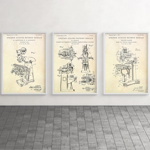 May include: Three vintage patent drawings for a milling machine. The drawings are in black and white and show the machine from different angles. The drawings are on a beige background with the text "United States Patent Office" at the top.