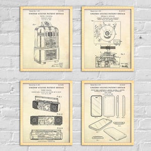 May include: Four framed patent prints. The prints show technical drawings of a jukebox, record player, boombox, and smartphone. The prints are in black and white with a vintage paper background, displayed against a white brick wall.
