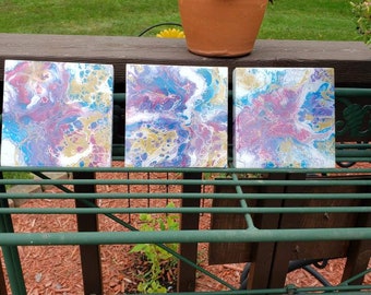 Set of three, resined 8x8x1 inch acrylic pour on wooden cradle board purple and blue