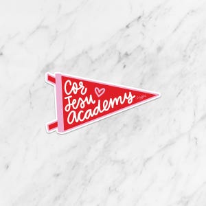 May include: Red and pink pennant with the text "Cor Jesu Academy" and a pink heart.