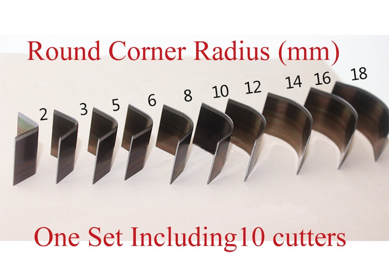 May include: A set of 10 round corner radius cutters for leather crafting. The cutters are made of metal and come in sizes ranging from 2mm to 18mm. The text "Round Corner Radius (mm)" and "One Set Including 10 cutters" is printed on the white surface.
