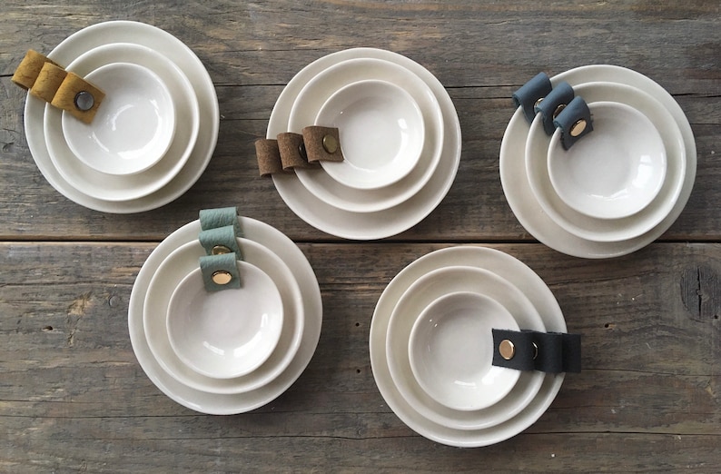 Porcelain and leather trinket dishes