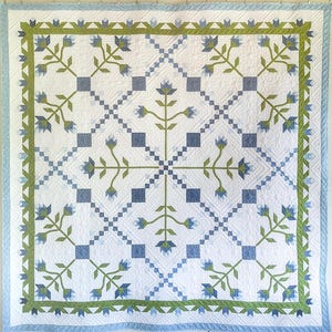 May include: A rustic wooden sign with the text "Welcome to our home" in white lettering. The sign features a distressed finish and a simple, inviting design, perfect for a front porch or entryway.