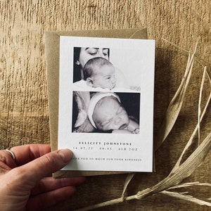 May include: Black and white photo thank you card with two photos of a newborn baby girl. The card reads "Felicity Johnstone 14.07.22 08:45 6lb 10oz Thank you so much for your kindness."