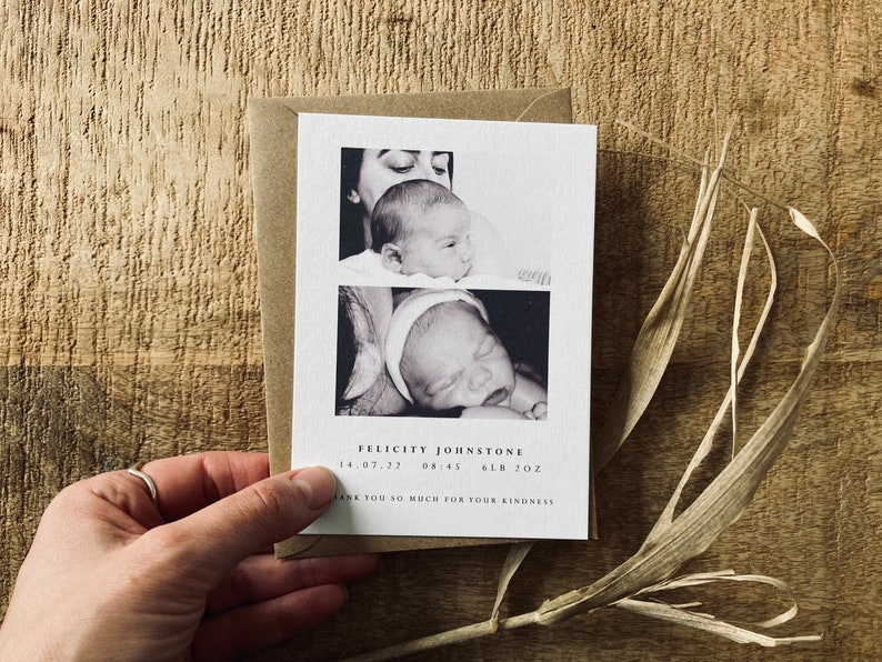 May include: Black and white photo thank you card with two photos of a newborn baby girl. The card reads "Felicity Johnstone 14.07.22 08:45 6lb 10oz Thank you so much for your kindness."