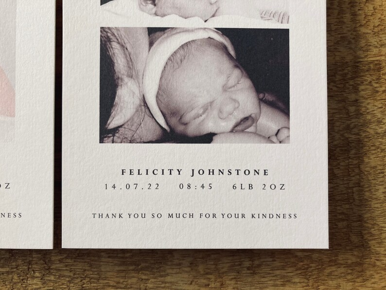 May include: A black and white photograph of a newborn baby girl named Felicity Johnstone, born on 14 July 2022 at 08:45, weighing 6 pounds and 2 ounces.