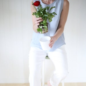 Minimal sleeveless linen blouse in Light Blue. Washed linen handmade top. image 1