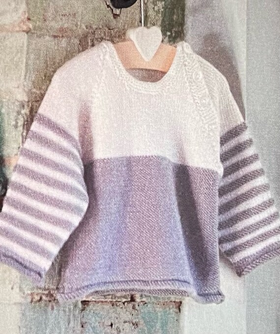 Schattige gebreide baby gestreepte trui brei een peuter een