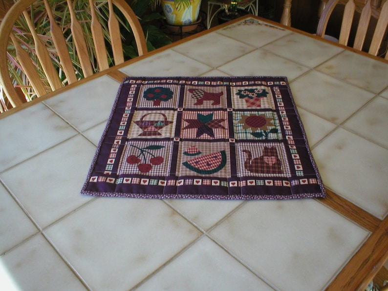 Table Topper 18 x 18 Quilted cotton Country Images in shades of rust and eggplant