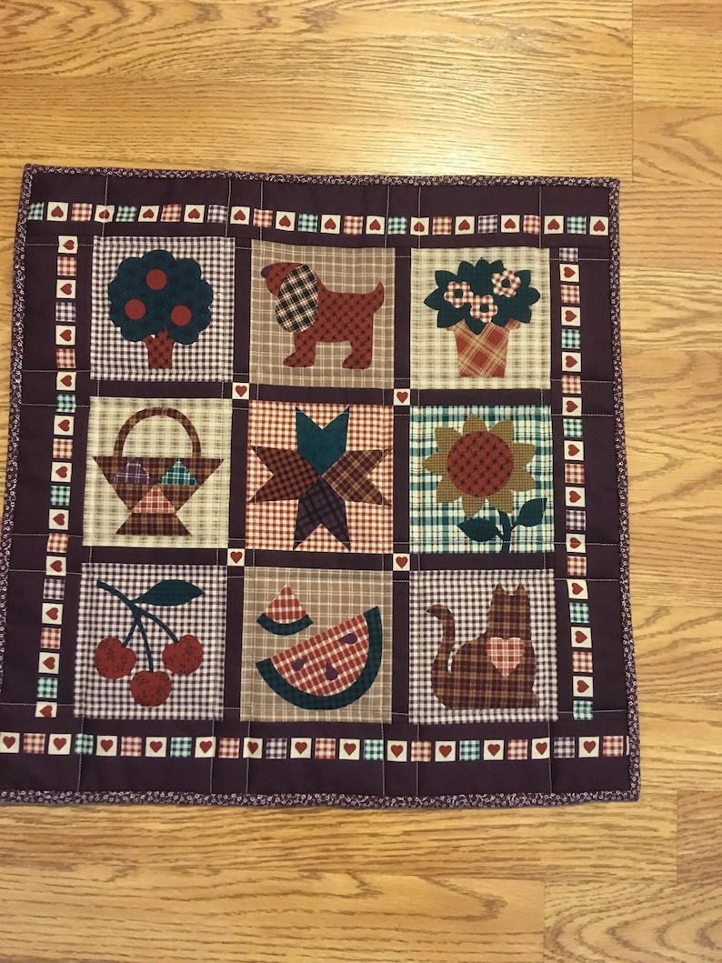 Table Topper 18 x 18 Quilted cotton Country Images in shades of rust and eggplant
