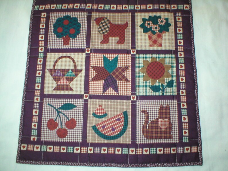 Table Topper 18 x 18 Quilted cotton Country Images in shades of rust and eggplant