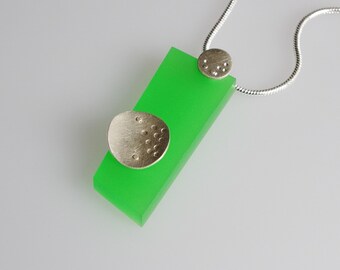 Green acrylic / plexi  necklace with sterling circles.