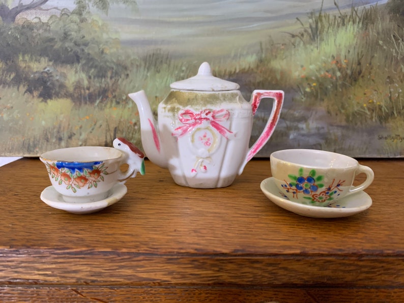 2 cups and saucers tea pot occupied Japan Vintage childrens tea set mix matched