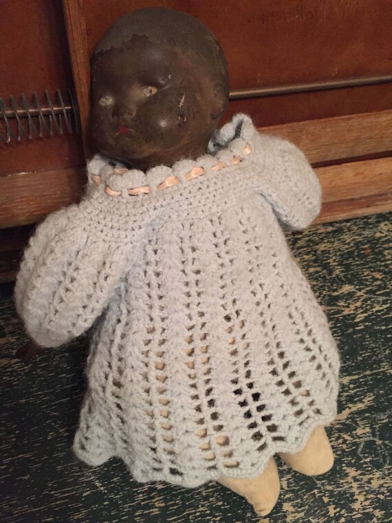 black composition doll