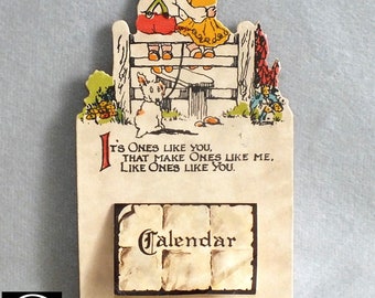 Vintage 1943 Illustrated Motto Calendar with Hand Drawn and Coloured Design of a Boy Girl and Dog