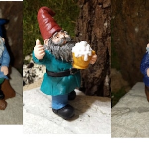 May include: Three miniature gnomes holding mugs of beer. The gnomes are wearing different colored hats and clothing. One gnome is sitting on a tree stump.