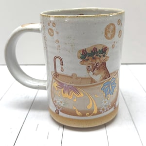 Taza "Push Push the Cat" para la hora del baño con oro de 24 quilates