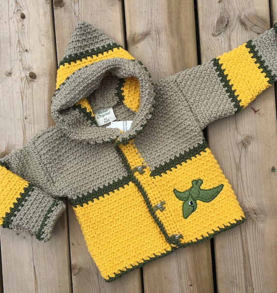 designer dinosaur sweater