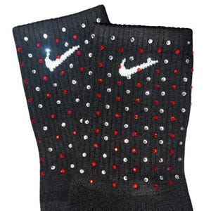 black nike socks with red swoosh