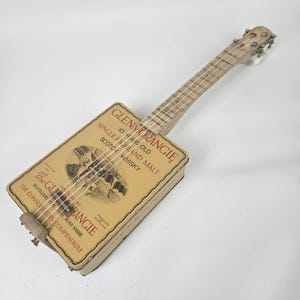 Classic Single Malt Whisky Tenor Ukulele, Whiskey Cigar Box Tin Electric Acoustic Uke, Upcycled Unique Stringed Electric Musical Instrument