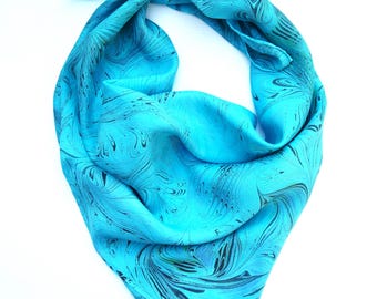Marbled silk square scarf in black, turquoise and blue.
