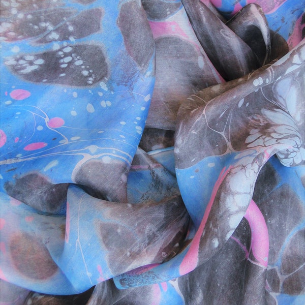 Blue silk scarf, hand dyed and marbled in a stone pattern with black and pink. Light and airy pongee 100% silk.