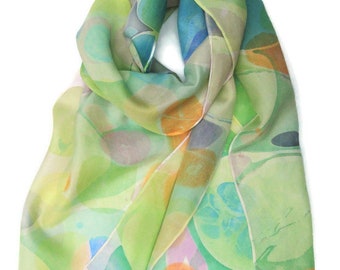 Marbled silk scarf, marbled on both sides in blue, green, purple, orange, white, yellow and pink.